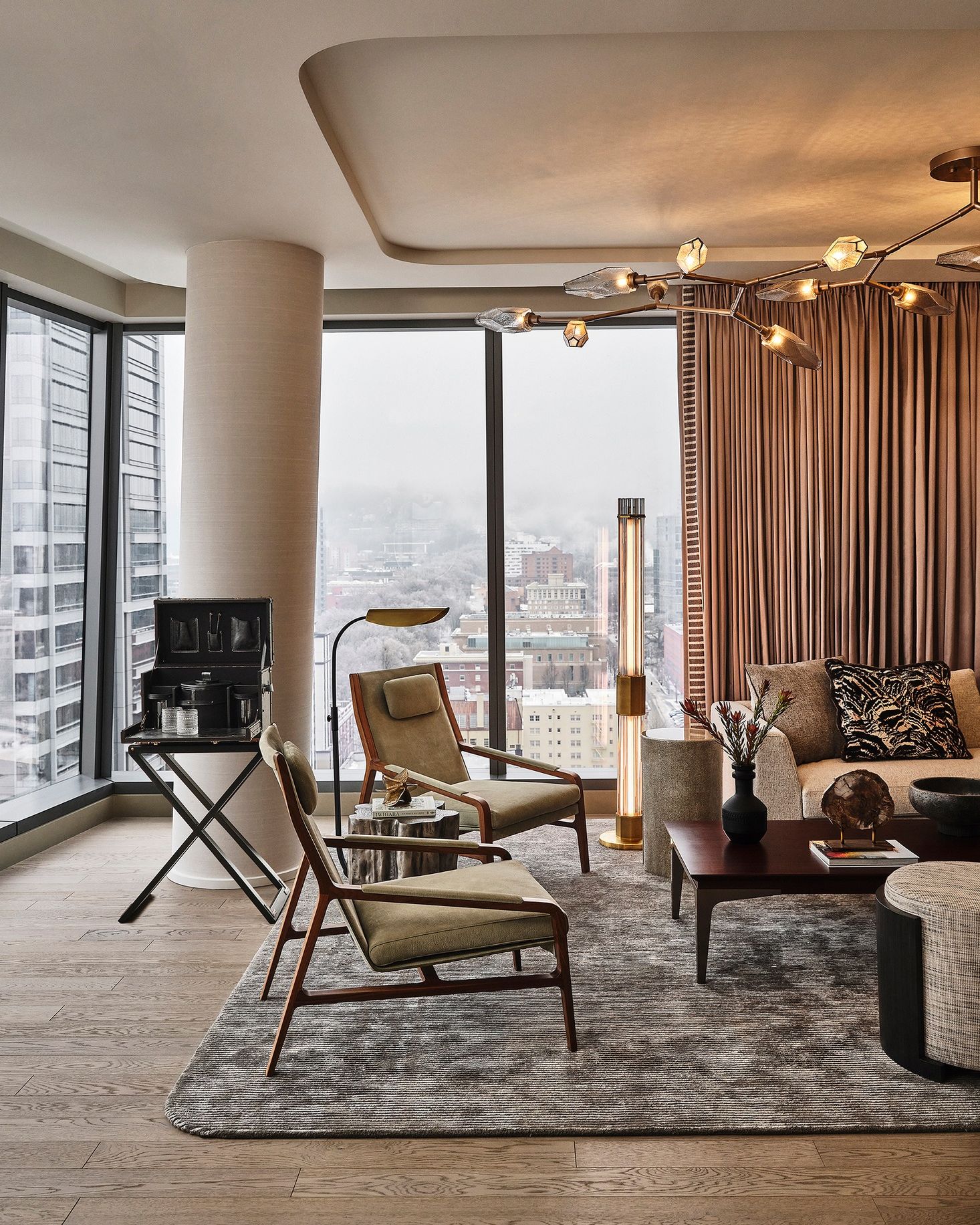 Image may contain Home Decor Indoors Interior Design Furniture Table Architecture Building Living Room and Room