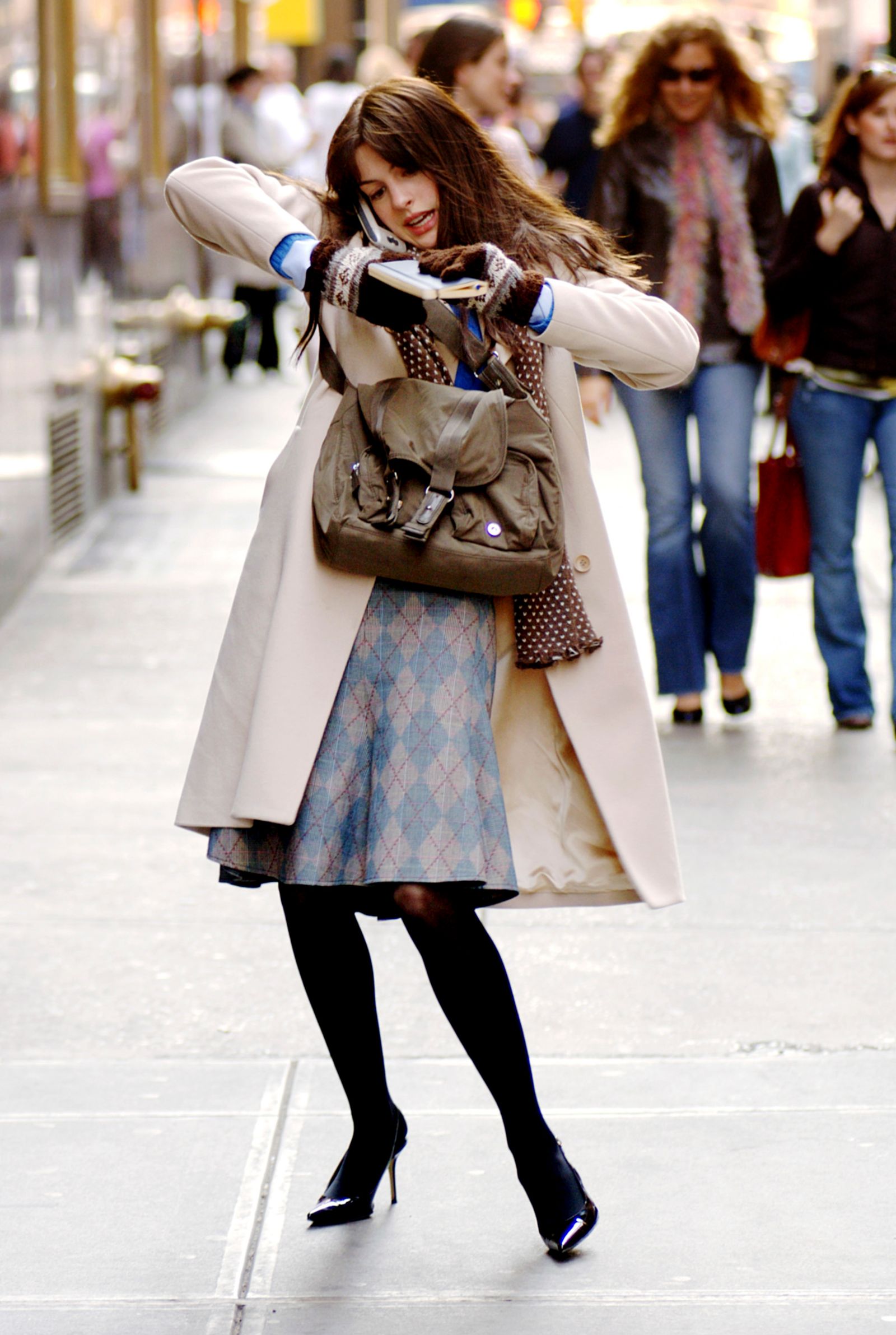 Image may contain Anne Hathaway Vicki MovsessianLamoriello Accessories Bag Handbag Clothing Coat Jeans and Pants