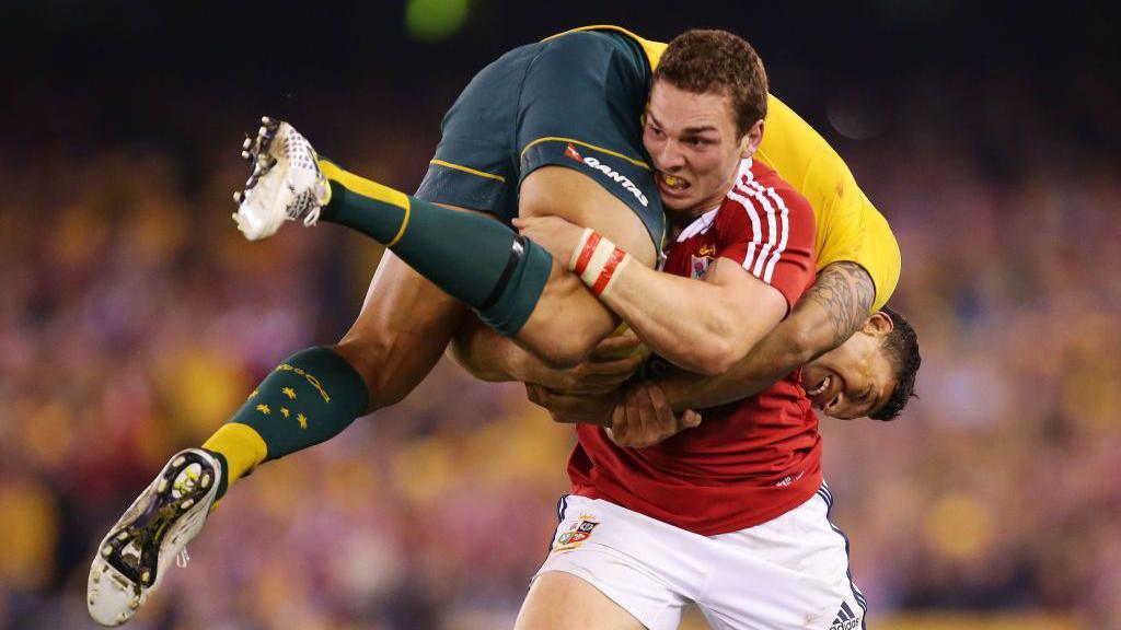 George North carries Israel Folau on his shoulder in 2013