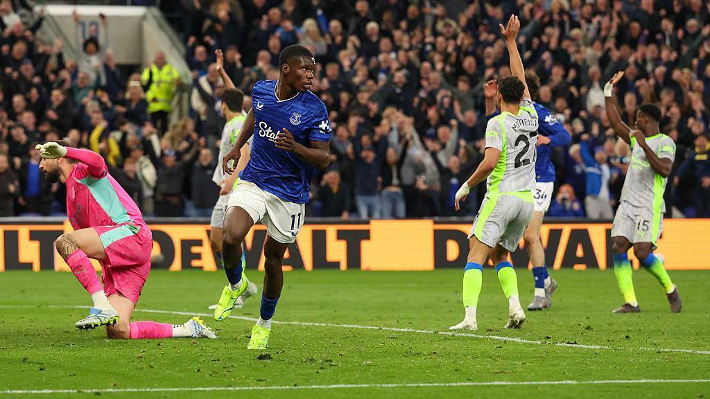 Everton's Thierno Barry celebrates scoring his side's second goal as Manchester City players appeal for offside