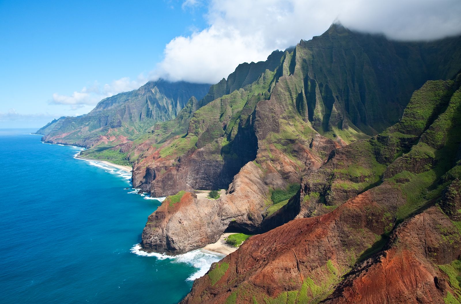 Image may contain Nature Outdoors Sea Water Scenery Shoreline Coast Cliff and Land