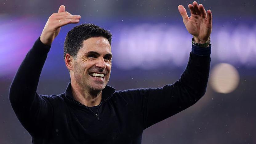 Arsenal boss Mikel Arteta celebrates after his side's win over Atletico Madrid in the Champions League
