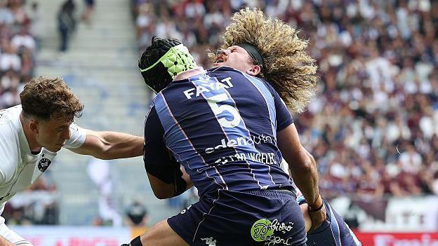 Bath's Alfie Barbeary is tackled by Bordeaux's Adam Coleman