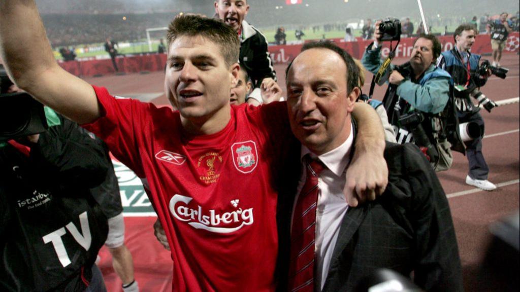 Former Liverpool captain Steven Gerrard celebrates winning the Champions League in 2005 with manager Rafael Benitez.