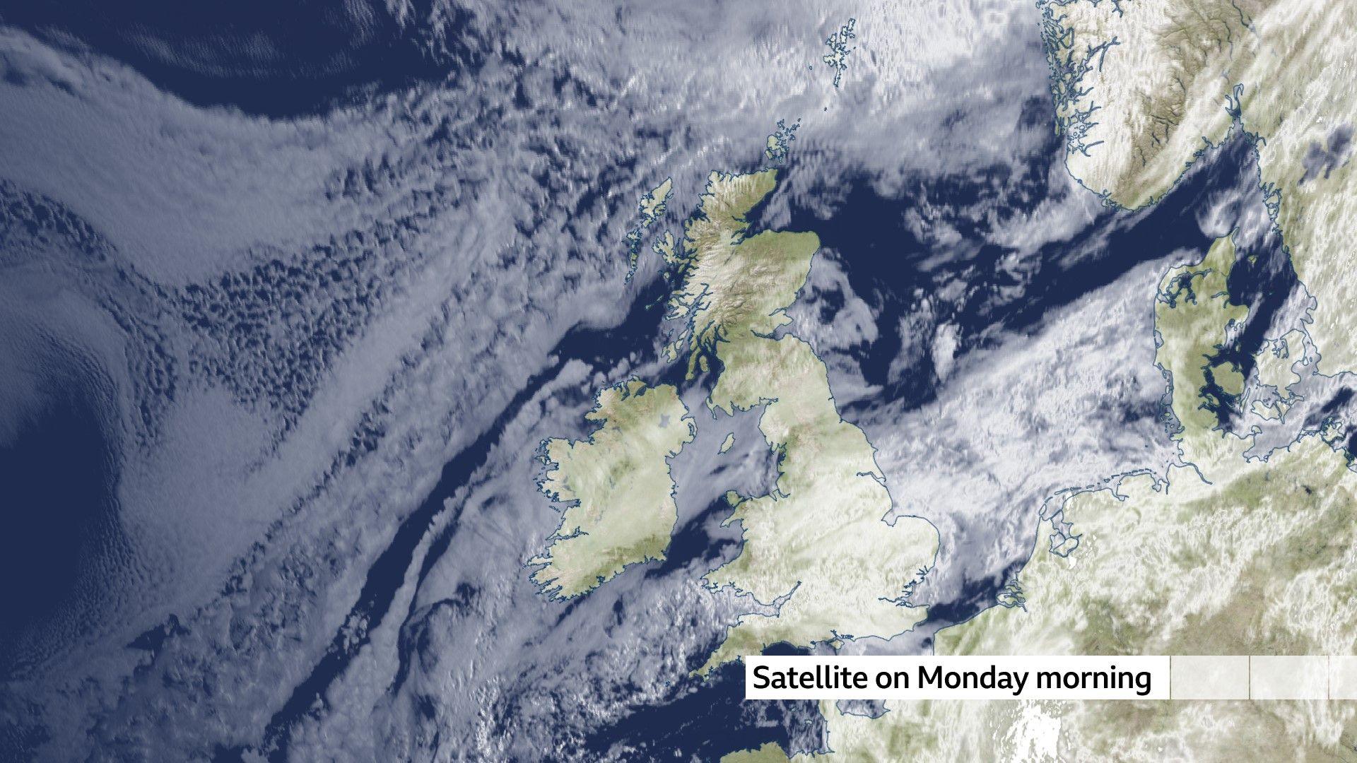 Map of the UK showing the visible satellite picture, breaks in the cloud are more evident already in the north