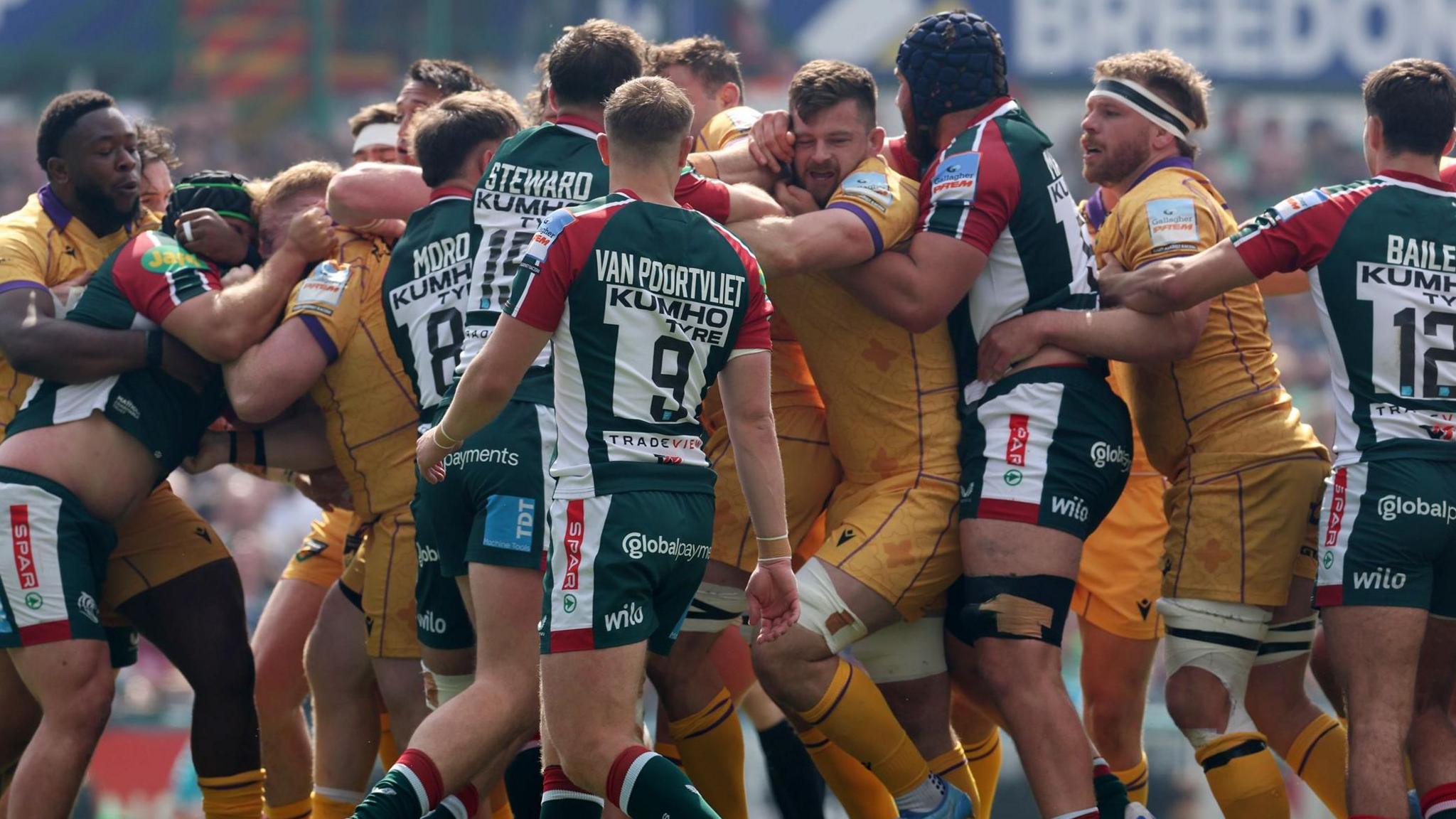 Northampton and Leicester push and grapple with each other during their game at Welford Road