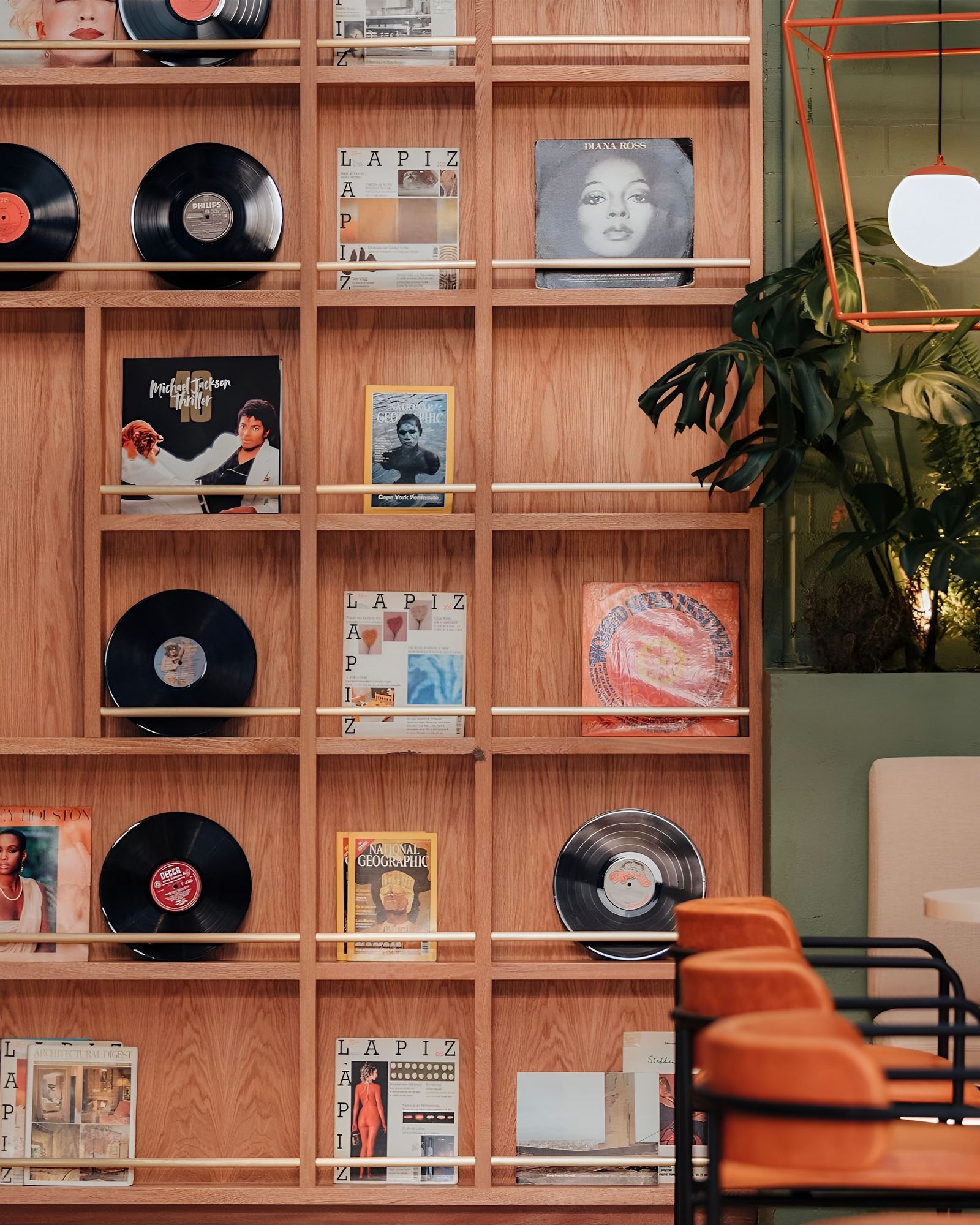 Image may contain Diana Ross Michael Jackson Furniture Bookcase Person Hardwood Wood Hockey and Ice Hockey