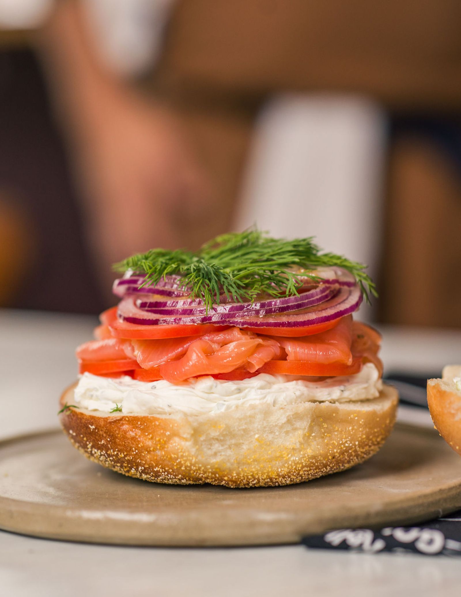 Image may contain Food Food Presentation Burger Bread Brunch and Person