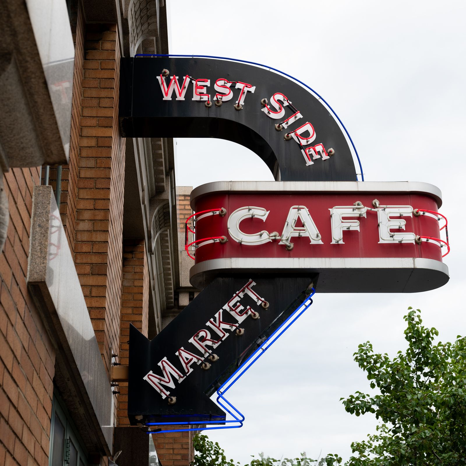Image may contain Architecture Building City Sign Symbol Indoors Restaurant Diner Food Factory Shop and Urban