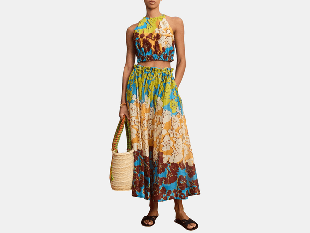Image may contain: Clothing, Dress, Beachwear, Adult, Person, Accessories, Bag, Handbag, Blouse, and Formal Wear