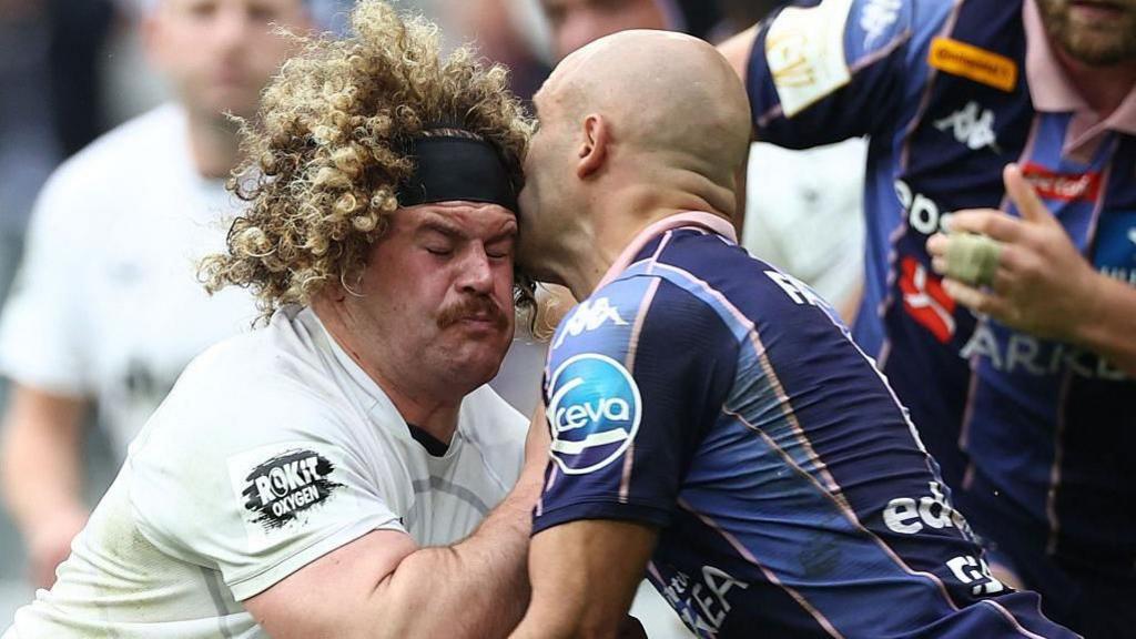 Bath's Alfie Barbeary is tackled high by Bordeaux's Maxime Lucu in their Champions Cup semi-final