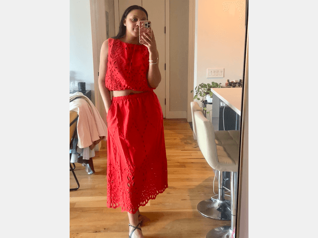 Image may contain: Clothing, Dress, Evening Dress, Formal Wear, Wood, Person, Teen, Hardwood, Adult, Fashion, Face, and Head