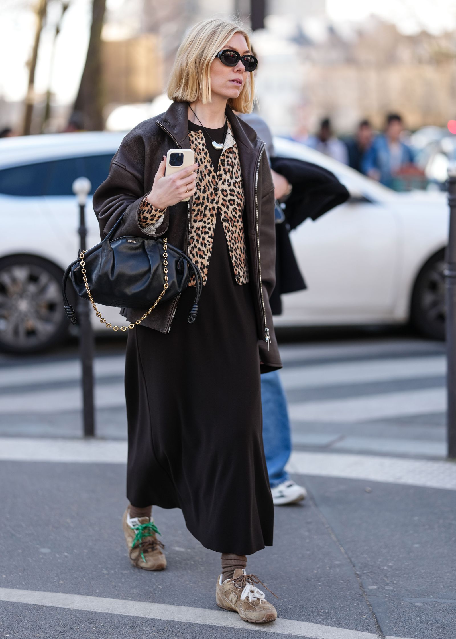 Image may contain Bill Kenney Pedestrian Person Accessories Bag Handbag Clothing Coat Car and Transportation