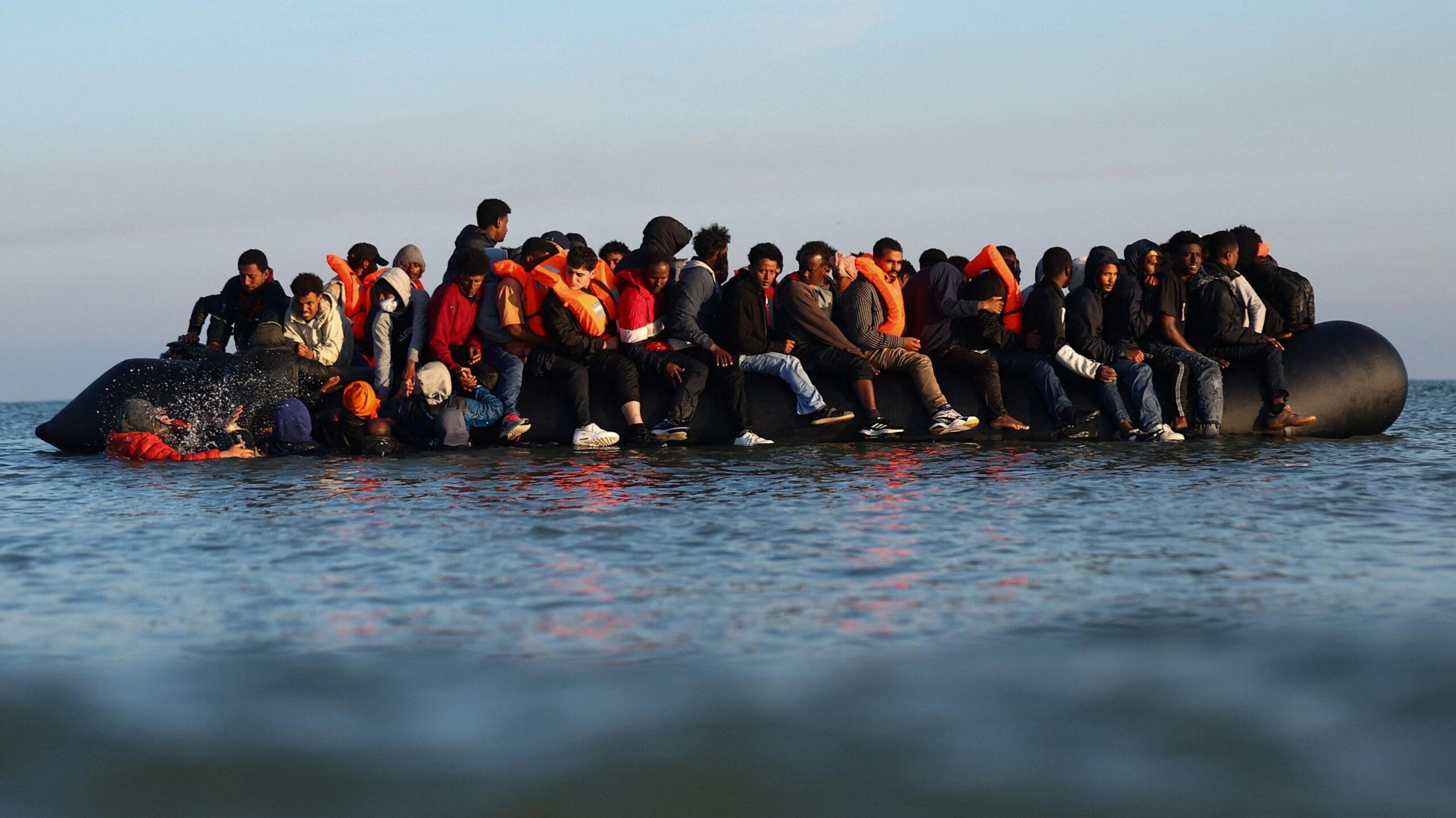 An overloaded dinghy in the English Channel