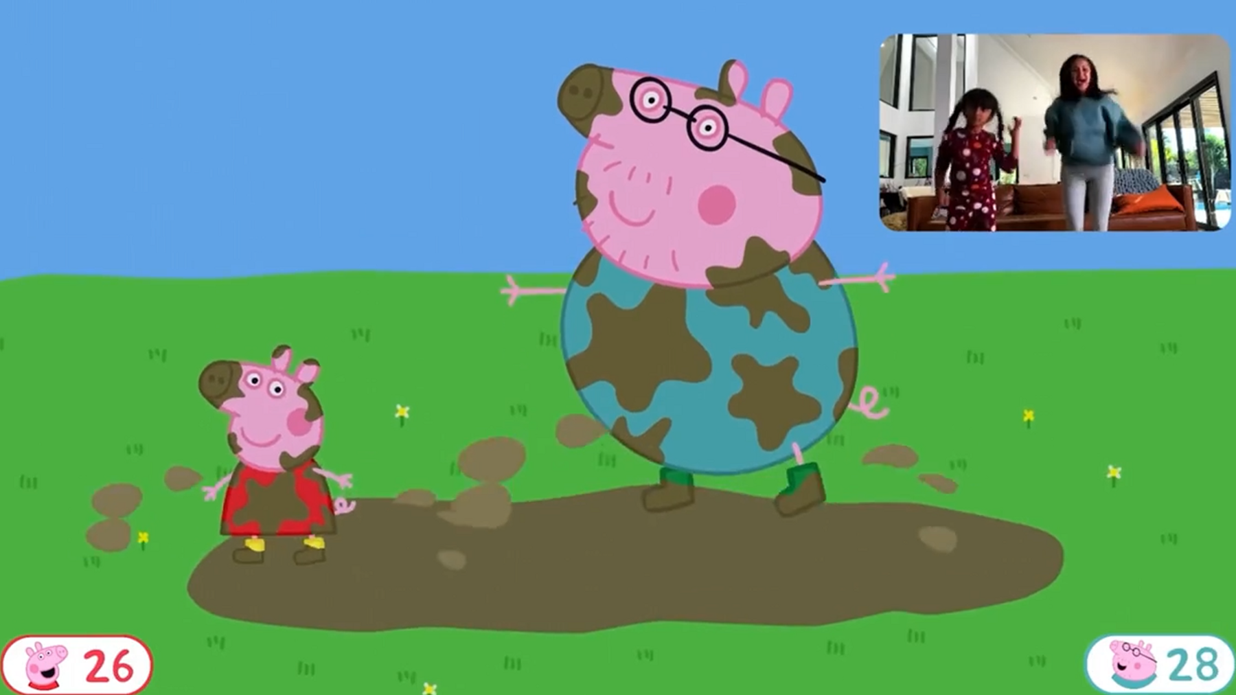 An in-game screenshot from the Nex Playground's Peppa Pig game, showing Peppa and her Dad covered in mud, and an insert from two people jumping to it on camera. In the bottom corners are scores of 26 and 28.