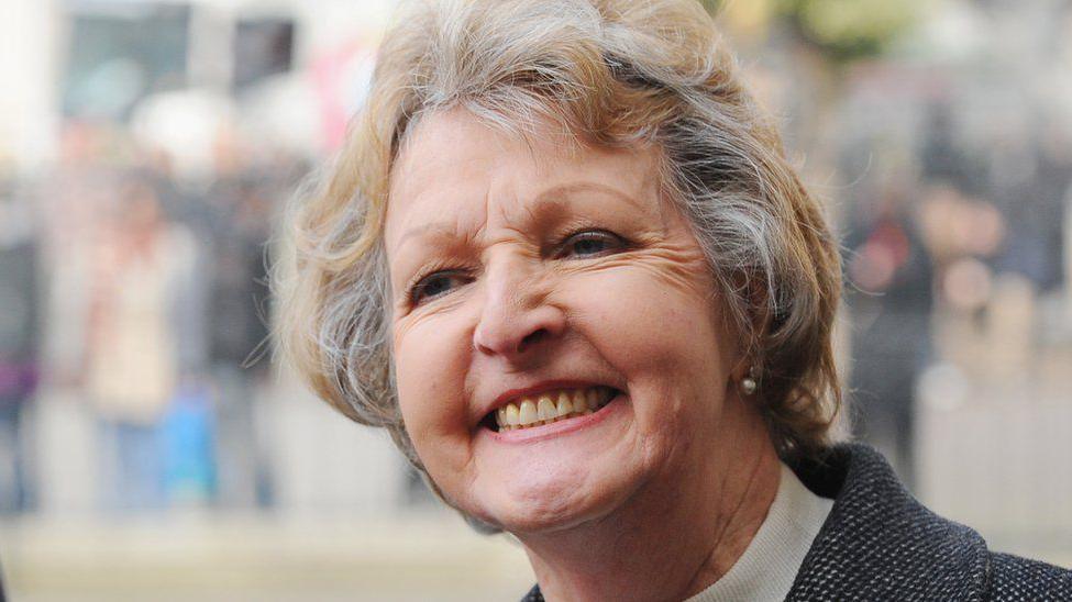 Penelope Keith is seen later in life smiling at the camera