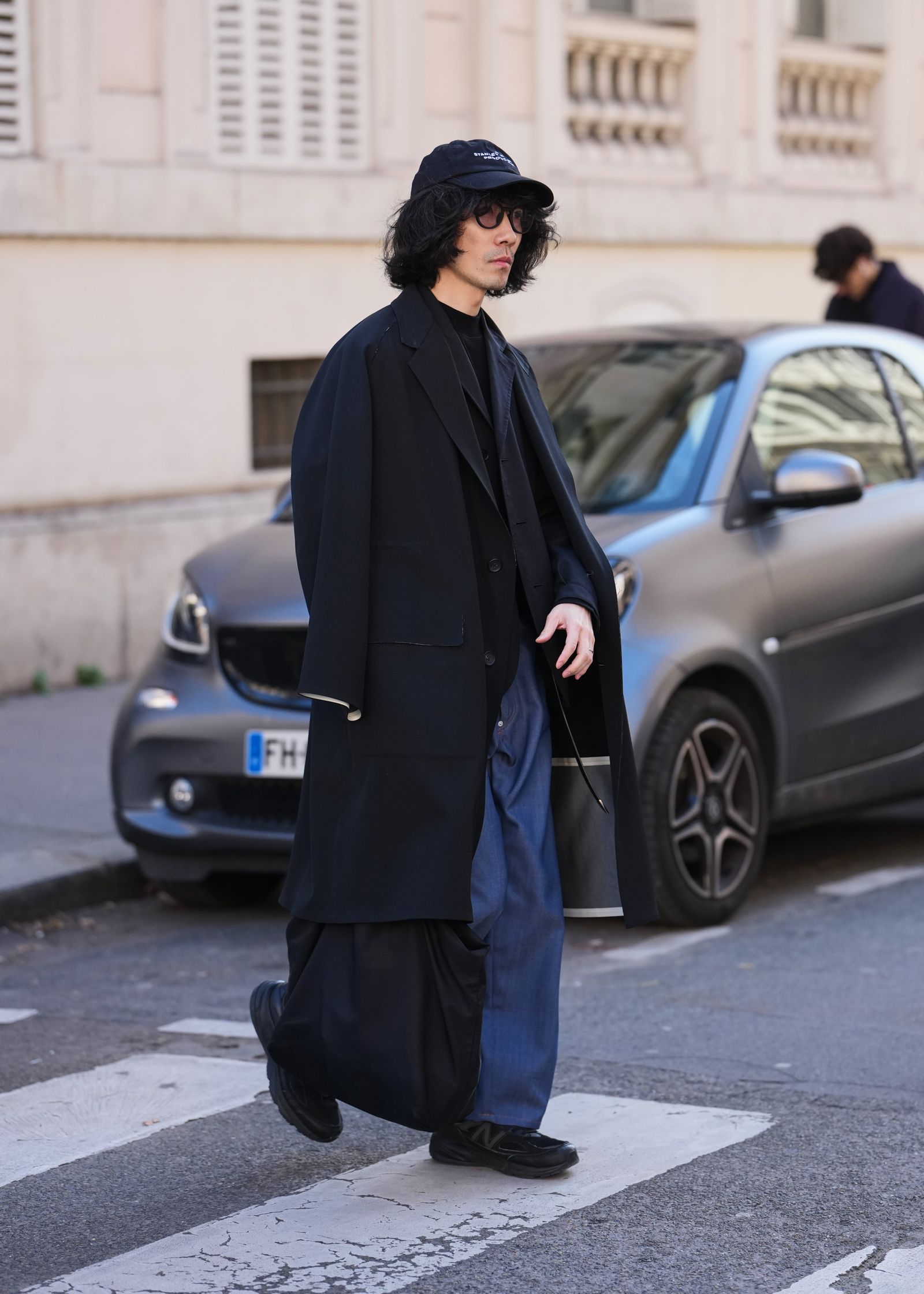 Image may contain Toshiyuki Toyonaga Clothing Coat Pedestrian Person Black Hair Hair Adult Accessories and Bag