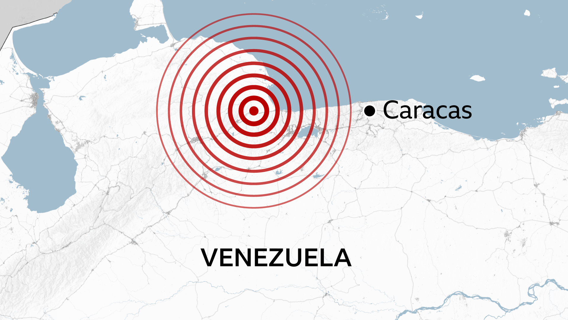 Map of northern Venezuela showing a large red concentric-circle marker indicating an earthquake epicentre near the north coast, west of Caracas. The capital city Caracas is labelled with a black dot to the east, and the label “Venezuela” appears across the map.