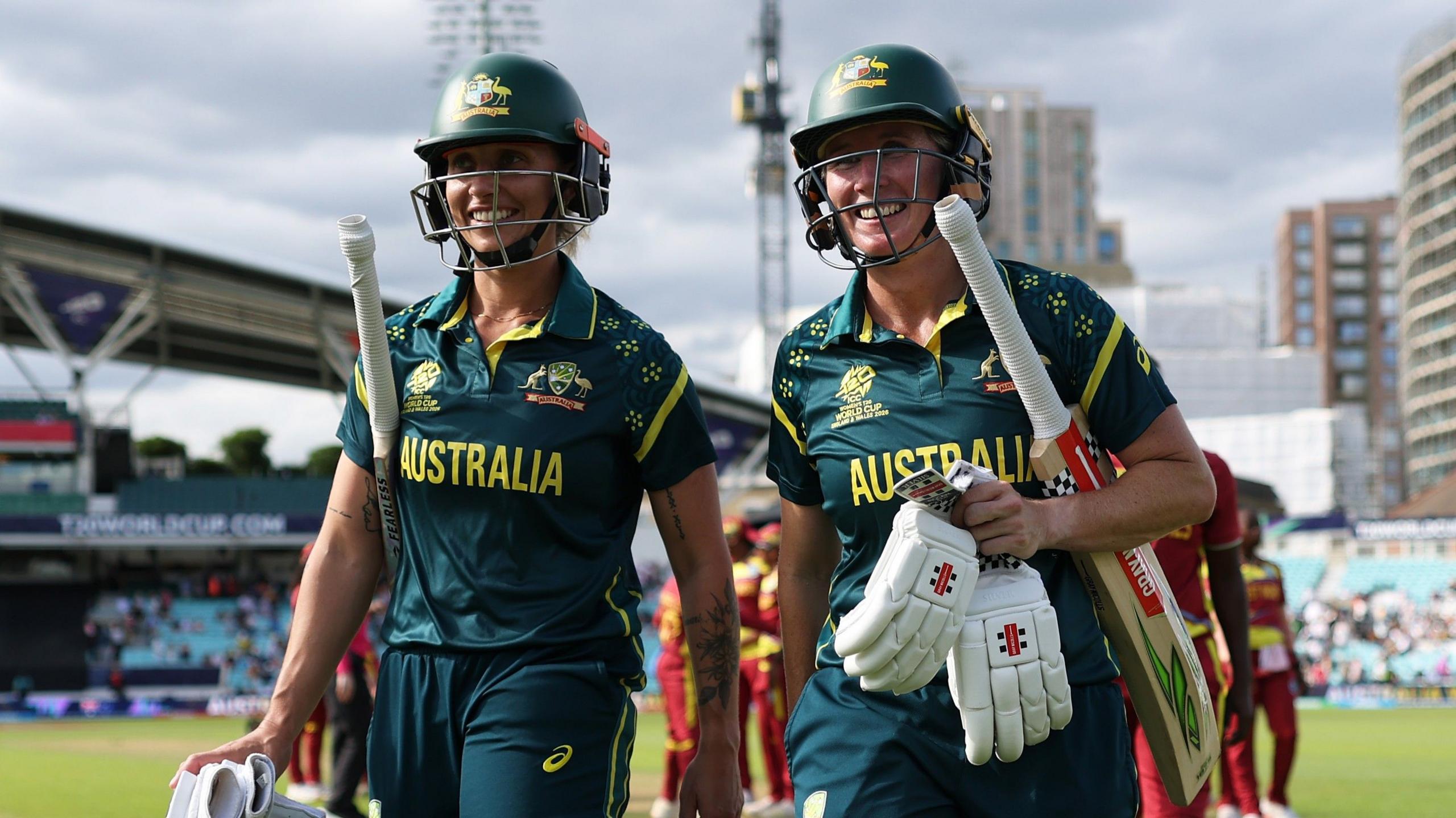 Australia batters Ash Gardner and Beth Mooney walk off smiling