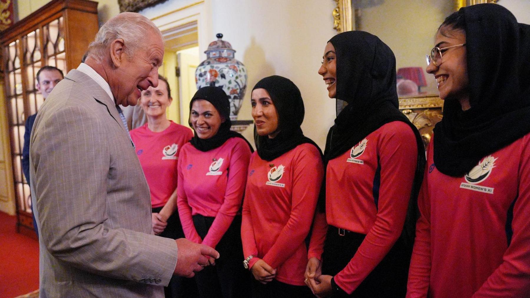 King Charles meeting the Afghan women's cricket team