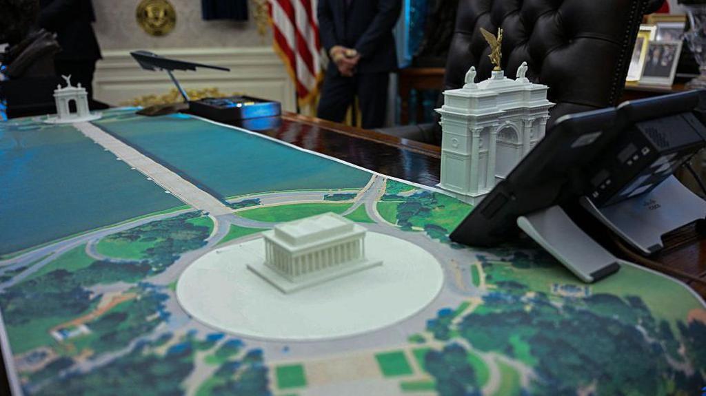 A plan for an arch across from the Lincoln Memorial is seen on the Resolute Desk as US President Donald Trump meets with Finnish President Alexander Stubb and Prime Minister Petteri Orpo in the Oval Office of the White House in Washington DC on 9 October 2025.