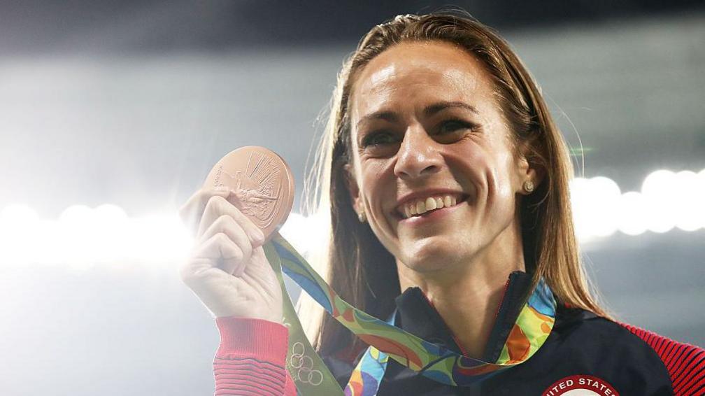 Olympic medallist Simpson collapses at mile event Olympic medallist Simpson collapses at mile event