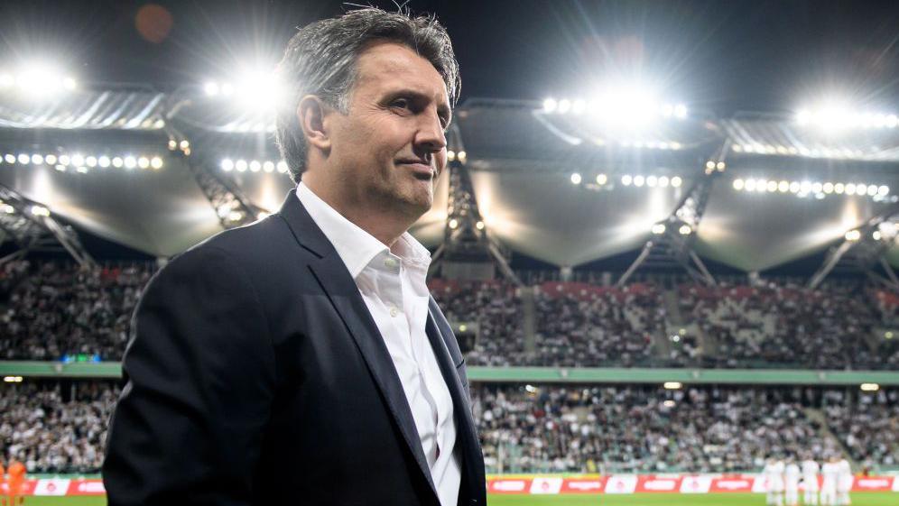Romeo Jozak smiling inside a stadium