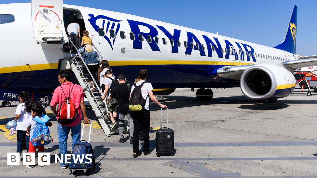 Ryanair investigated over charging parents to sit with children Ryanair investigated over charging parents to sit with children