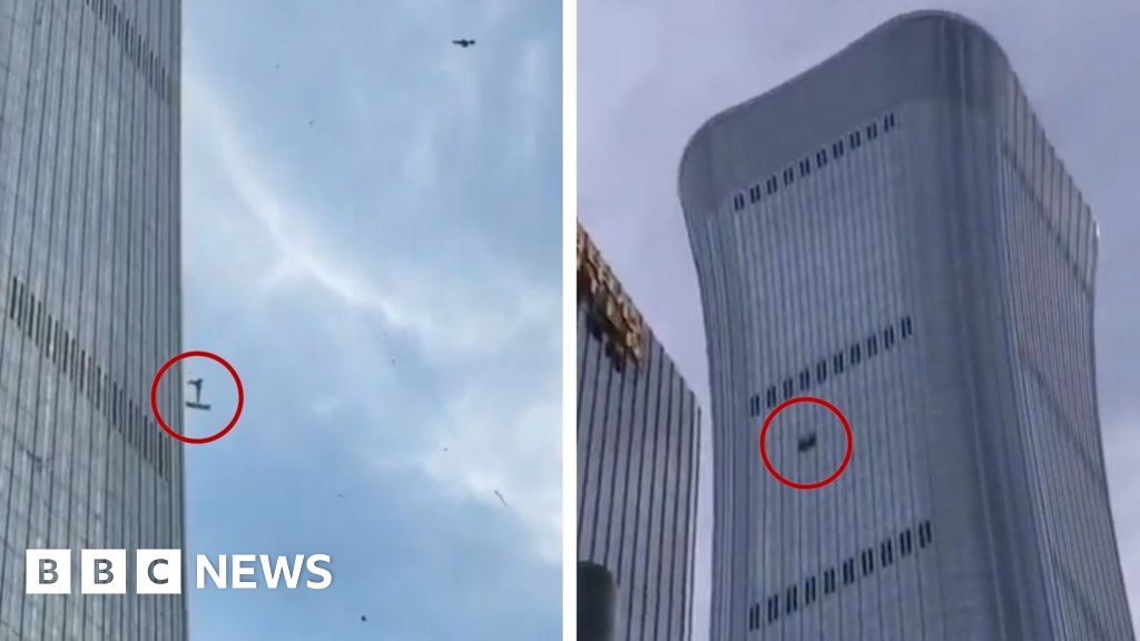 Debris falls after plane hits Beijing’s tallest building Debris falls after plane hits Beijing’s tallest building