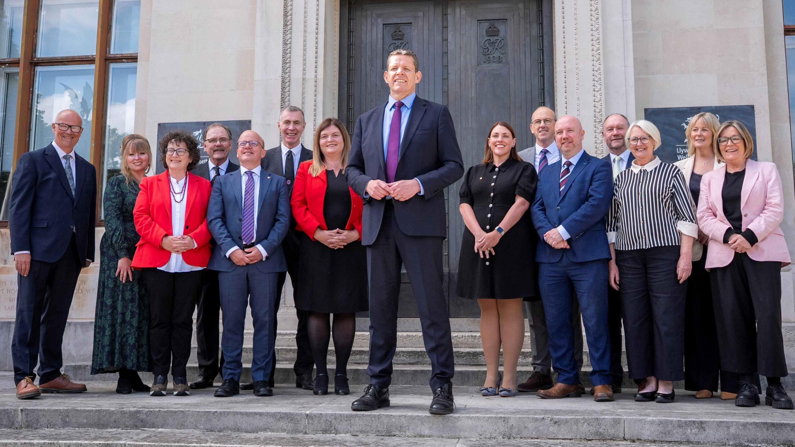 Rhun ap Iorwerth in the middle flanked by cabinet ministers