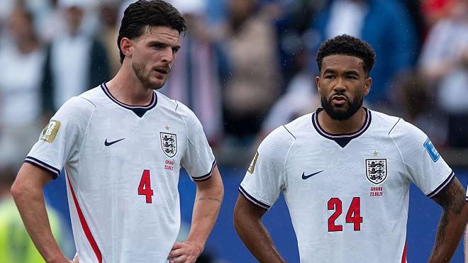 Declan Rice and Reece James stand with their hands on their hips during the draw against Ghana