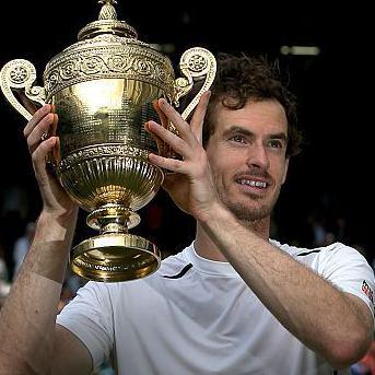 Andy Murray holding the Wimbledon trophy