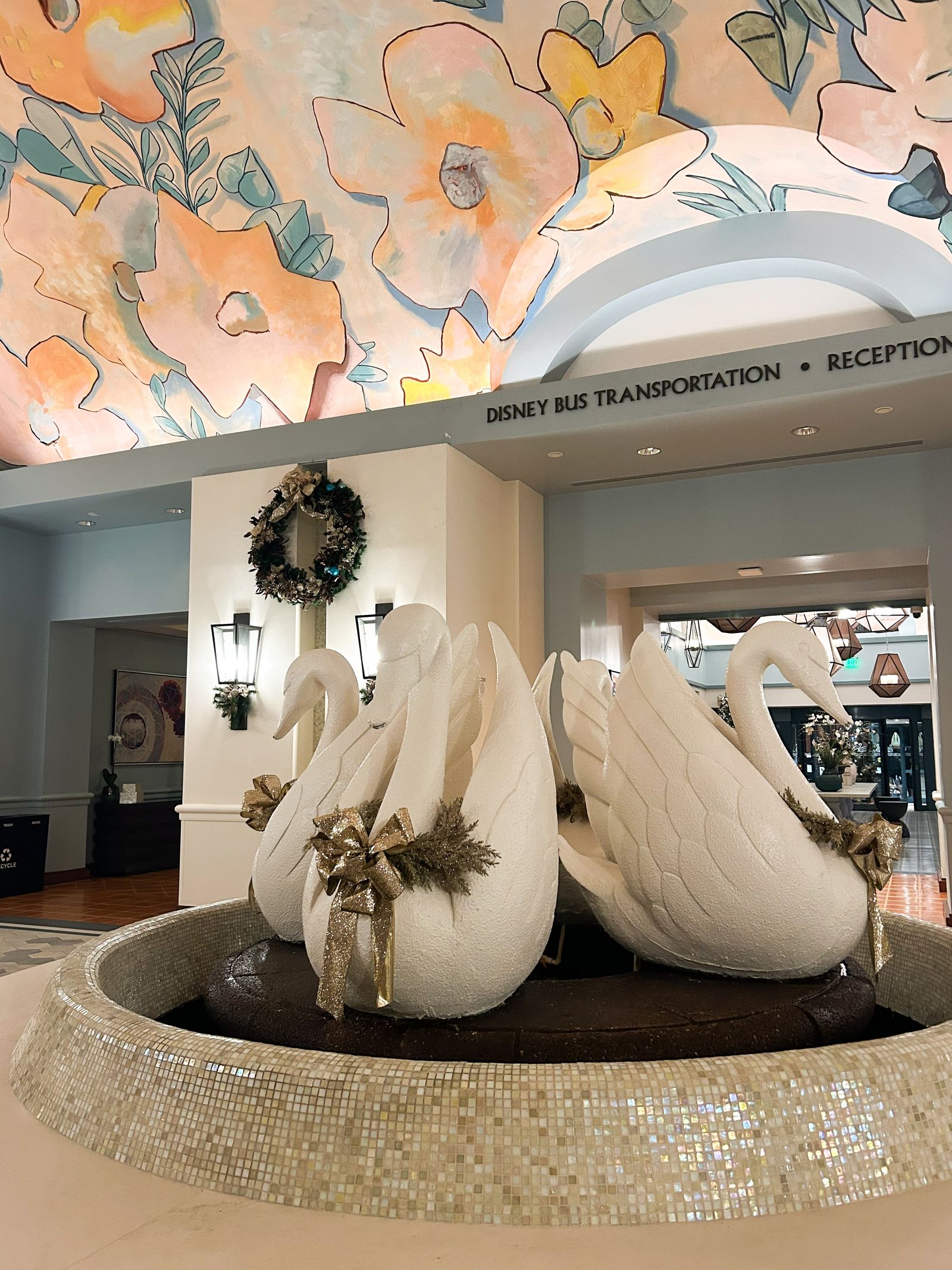 Image may contain Indoors Lamp Furniture Adult Person Wedding Architecture Building and Foyer