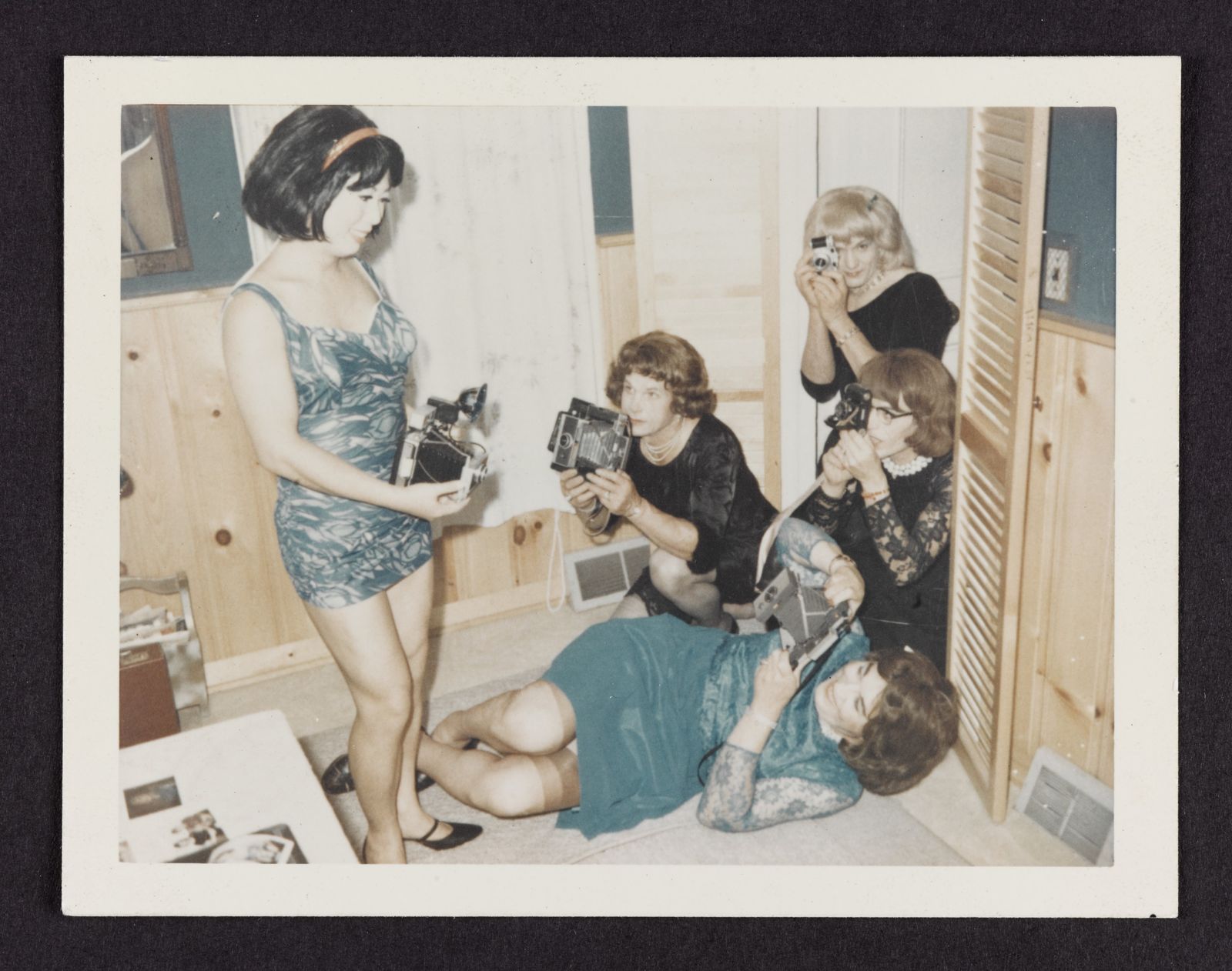 Image may contain Rei Kawakubo Jayne County Photography Adult Person Photographer Clothing Glove Shorts and Face