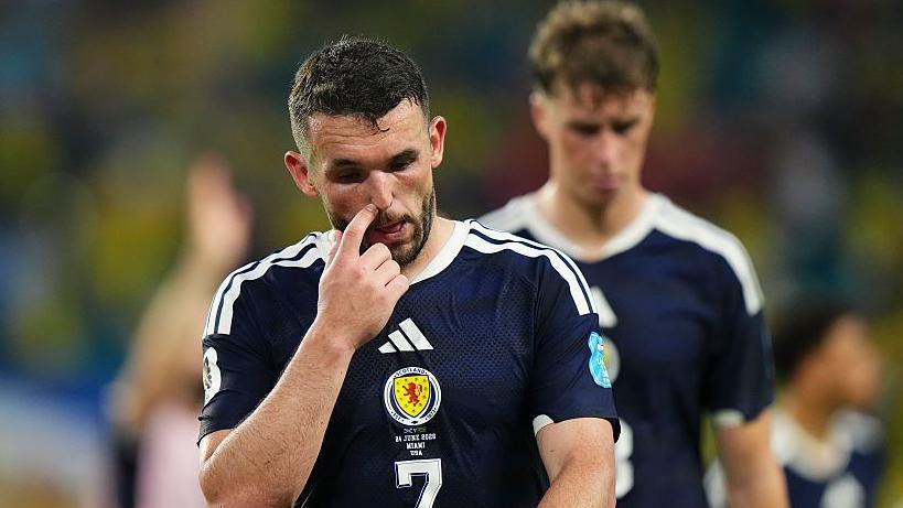 John McGinn dejected