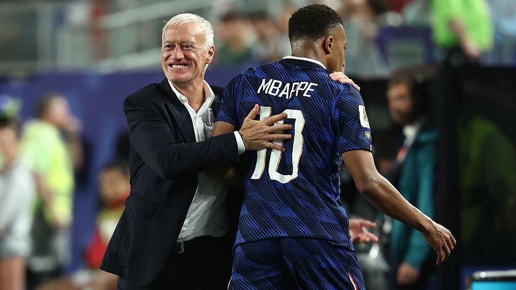 An image of Didier Deschamps and Kylian Mbappe hugging during the World Cup 2026