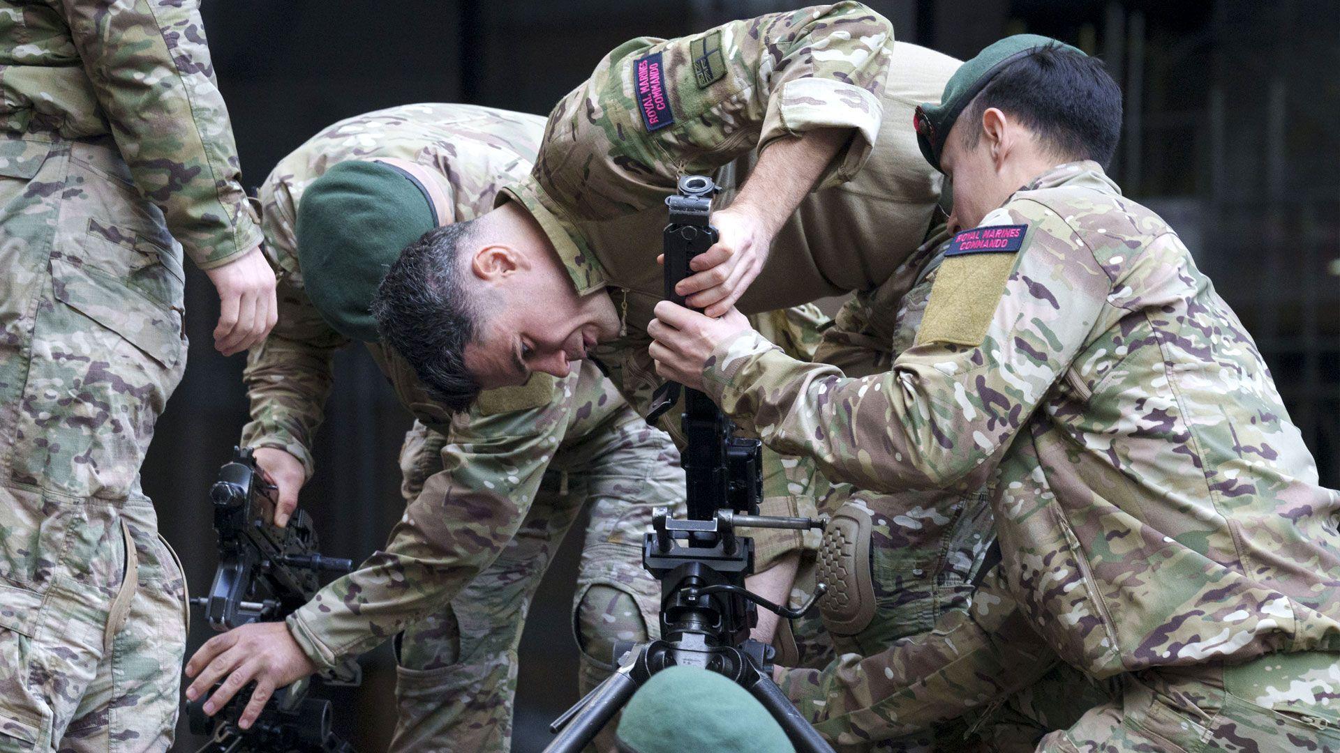 Members of the Royal Marines Reserve assemble a 50 calibre Heavy Machine Gun (HMG) before the first ever Lady Mayor's Show in the City of London, in November 2025