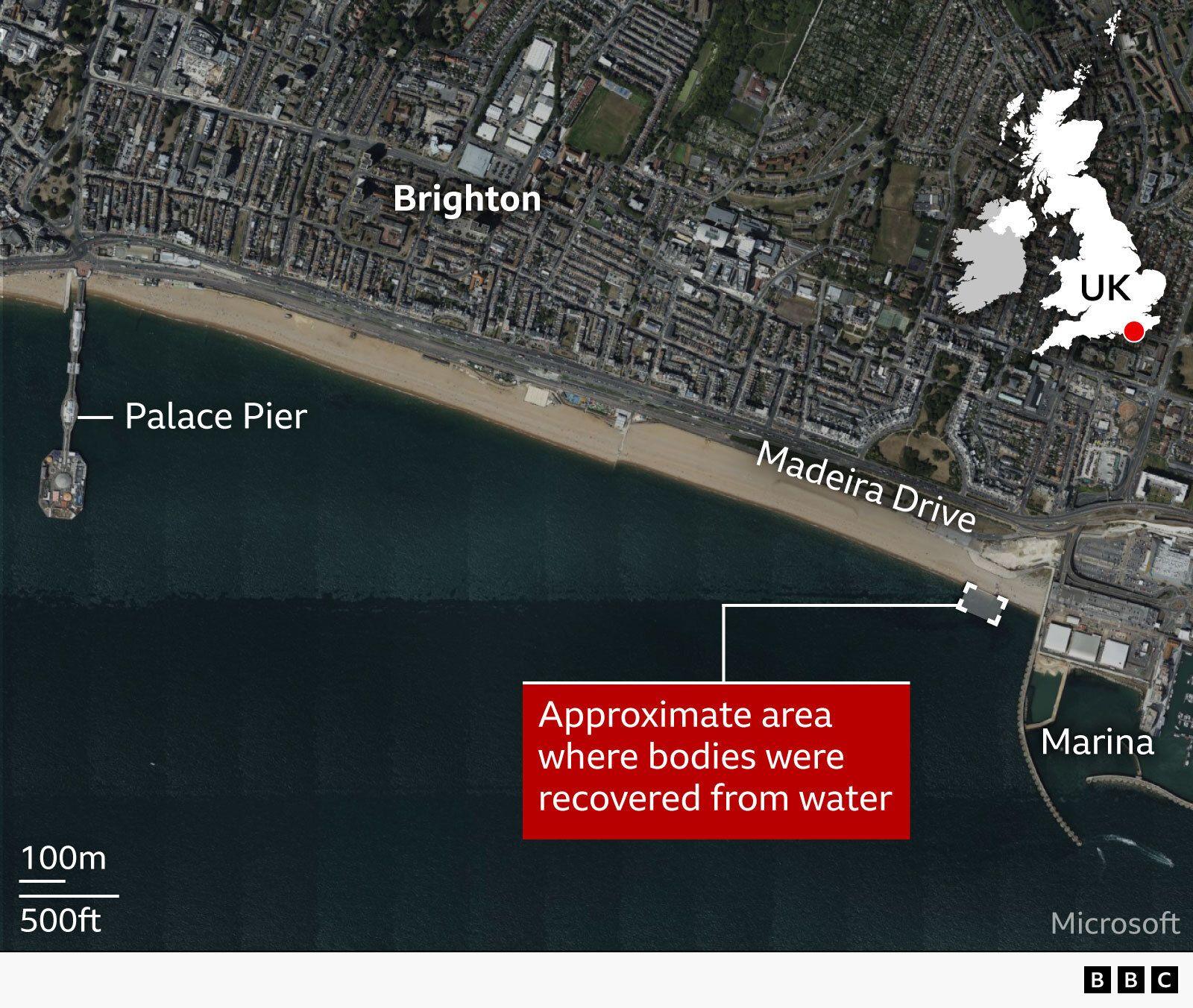 A satellite map of Brighton seafront in the UK showing the coastline, with labels for “Brighton,” “Palace Pier,” “Madeira Drive,” and “Marina.” A red box highlights the approximate area offshore where bodies were recovered from the water, east of the pier near the marina. A small inset map of the UK marks the location in southern England, and a scale bar indicates distance.