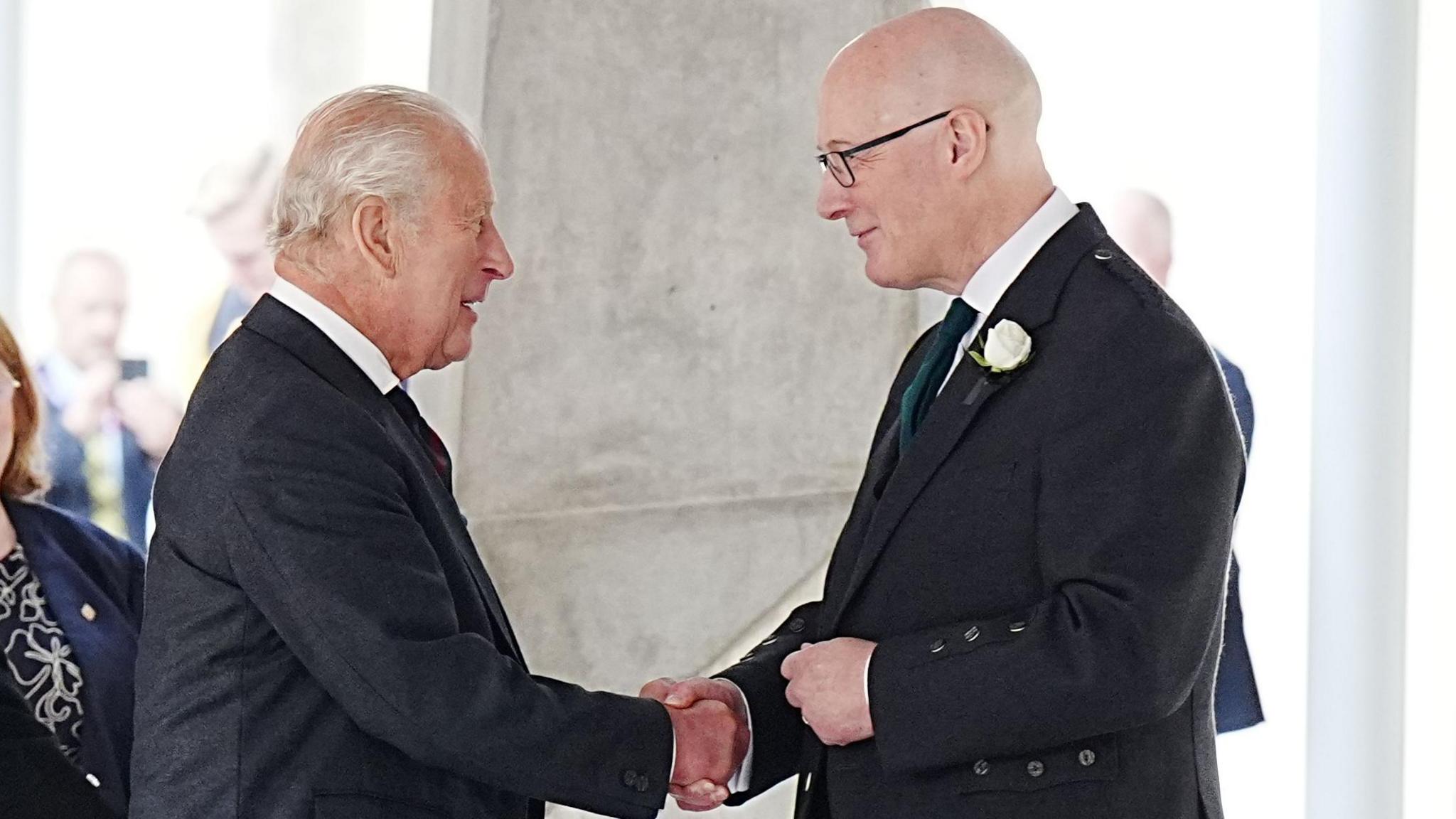 King Charles greets First Minister John Swinney