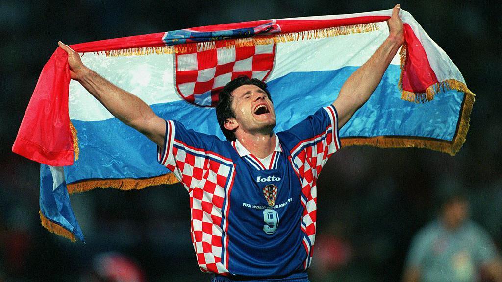 Davor Suker parading the flag of Croatia