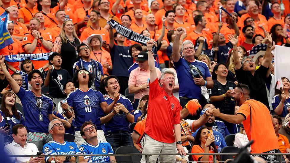 Japan and Netherlands supporters sat together during Sunday's match at Dallas