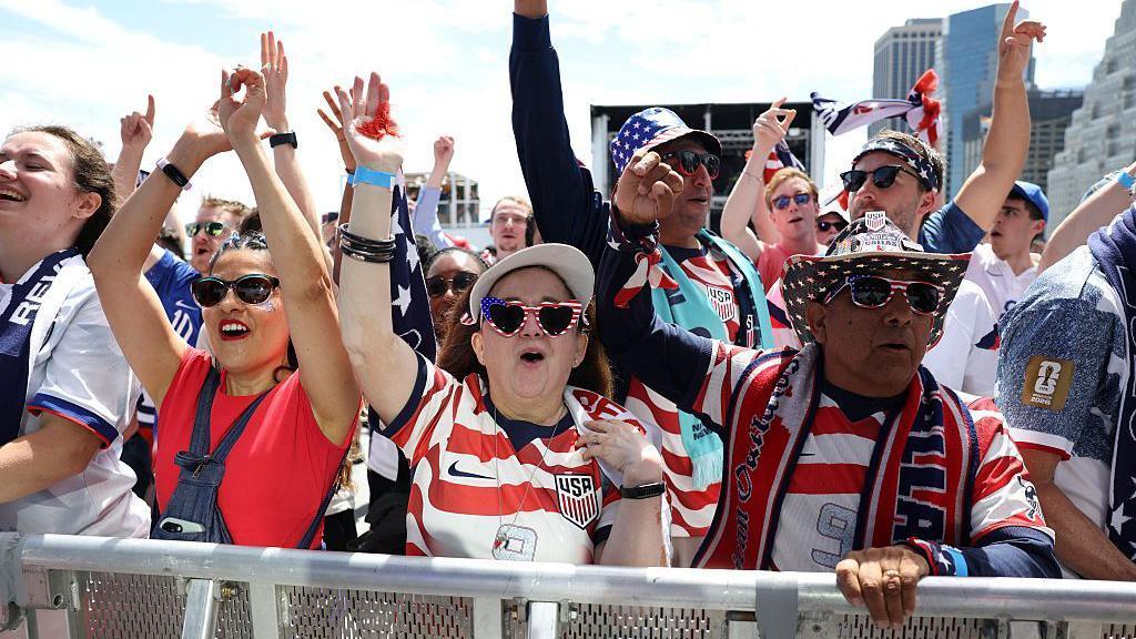 American fans cheer for the USA national team ahead of the World Cup