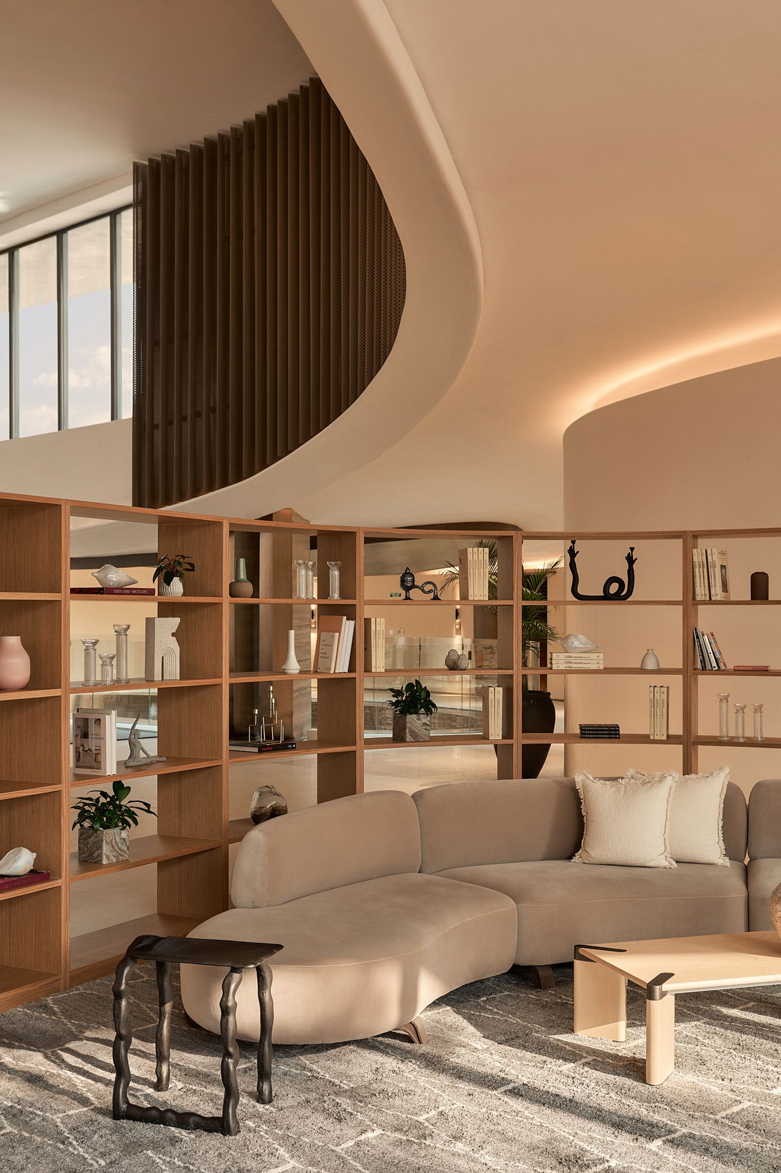 Image may contain Home Decor Architecture Building Furniture Indoors Living Room Room Plant and Interior Design
