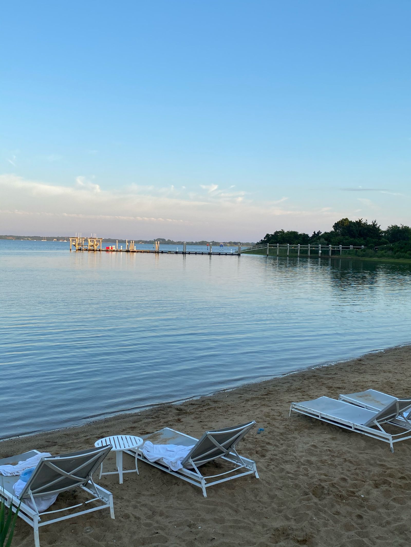 Image may contain Nature Outdoors Scenery Chair Furniture Sky Lakefront Horizon Water and Waterfront