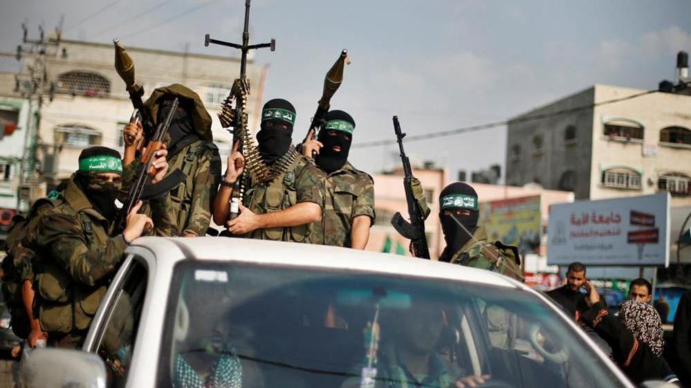 FILE PHOTO: Hamas militants celebrate what they say is a victory over Israel after an eight-day conflict during a rally in the northern Gaza Strip November 22, 2012