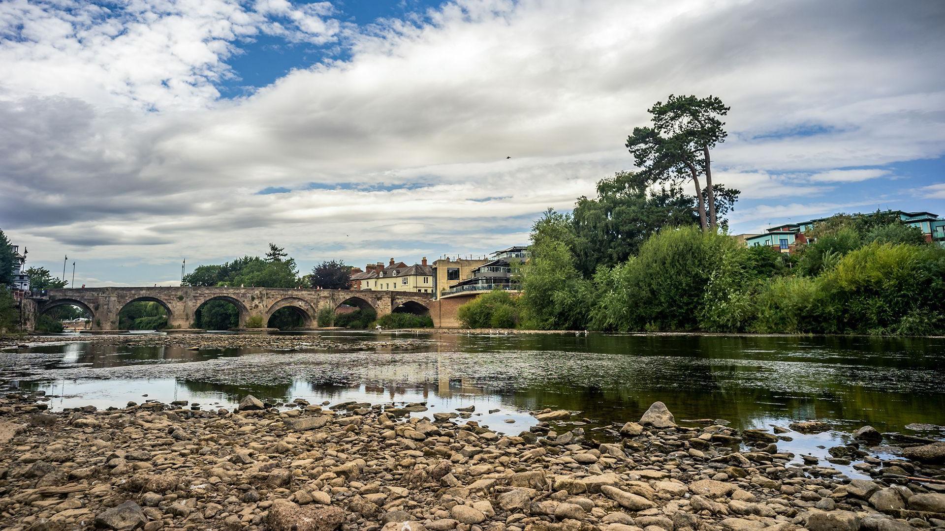 The river bed of the River Wye is seen exposed after weeks of no rainfall on 25th July 2026.