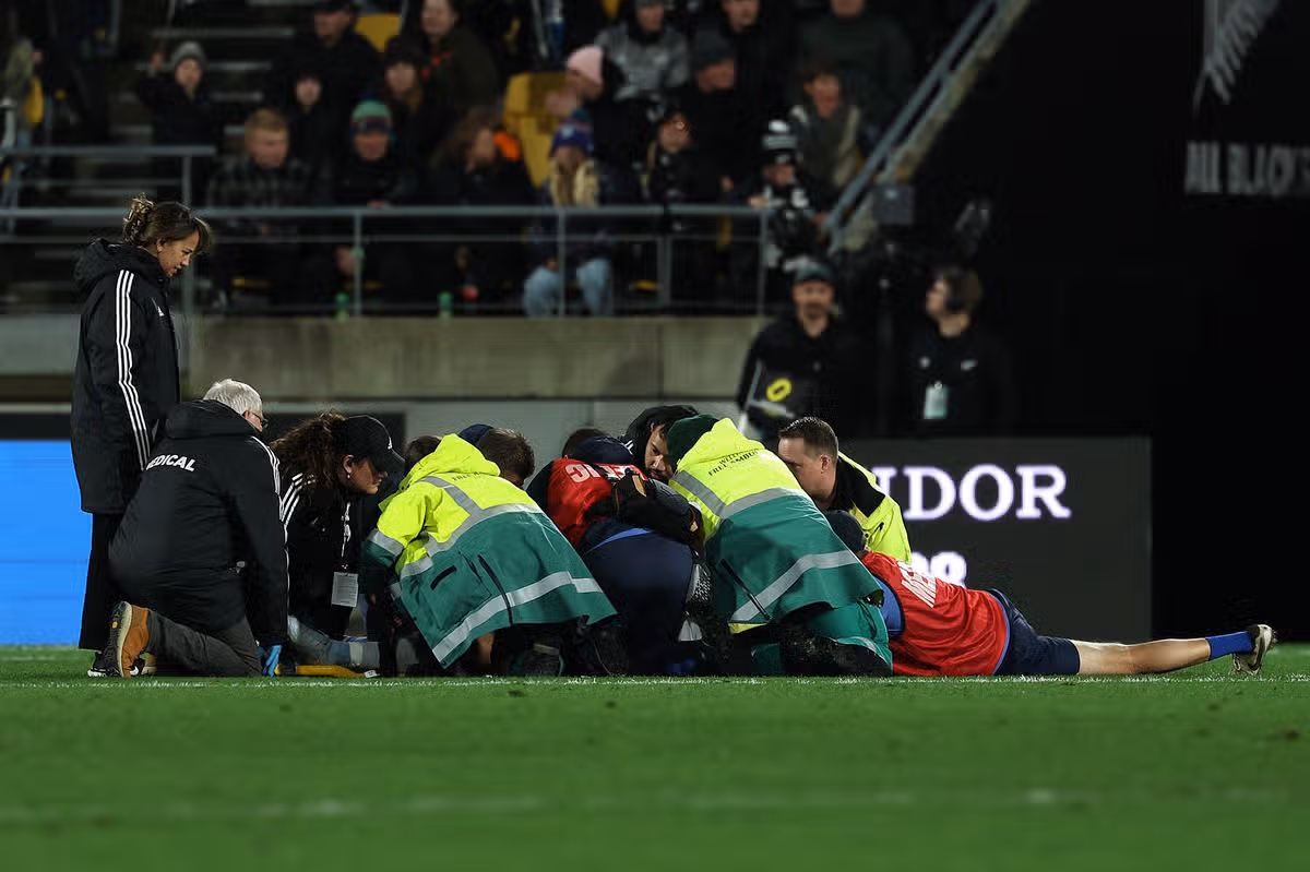 Tommaso Allan of Italy receives treatment for an injury