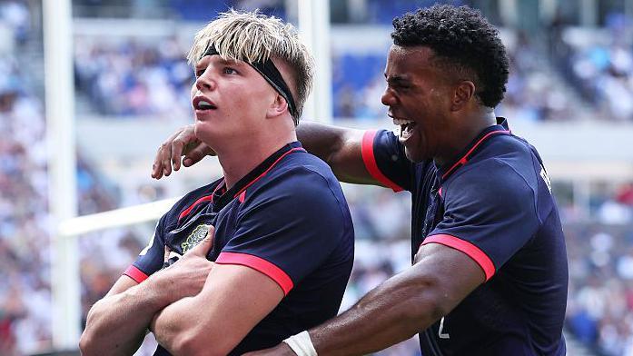 Henry Pollock and Immanuel Feyi-Waboso celebrate