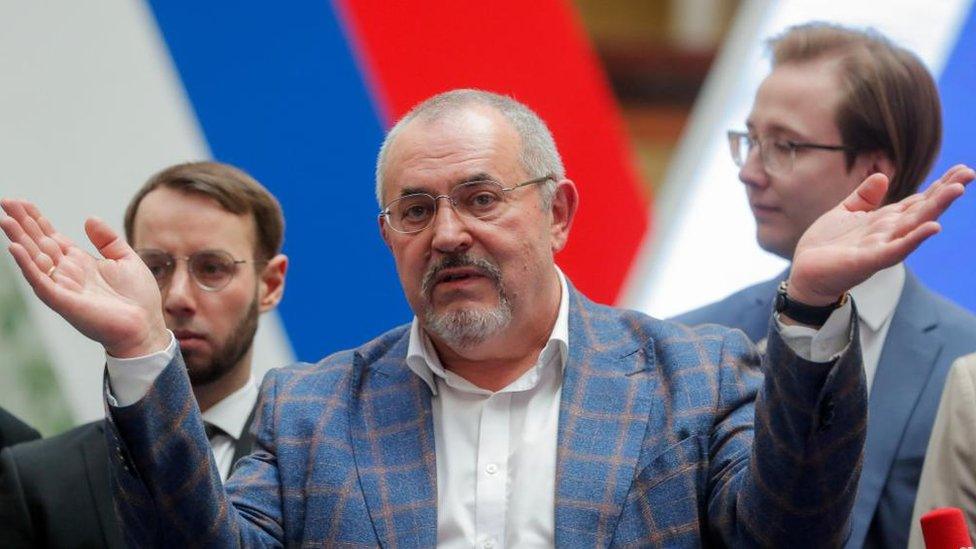 Boris Nadezhdin (L), Russian presidential candidate from the Civil Initiative party and deputy of the Council of Deputies of the Dolgoprudny urban district of the Moscow Region, speaks to the media after a meeting of the Russian Central Election Commission (CEC) over his registration as candidate for the Russian presidential elections, in Moscow, Russia, 08 February 2024