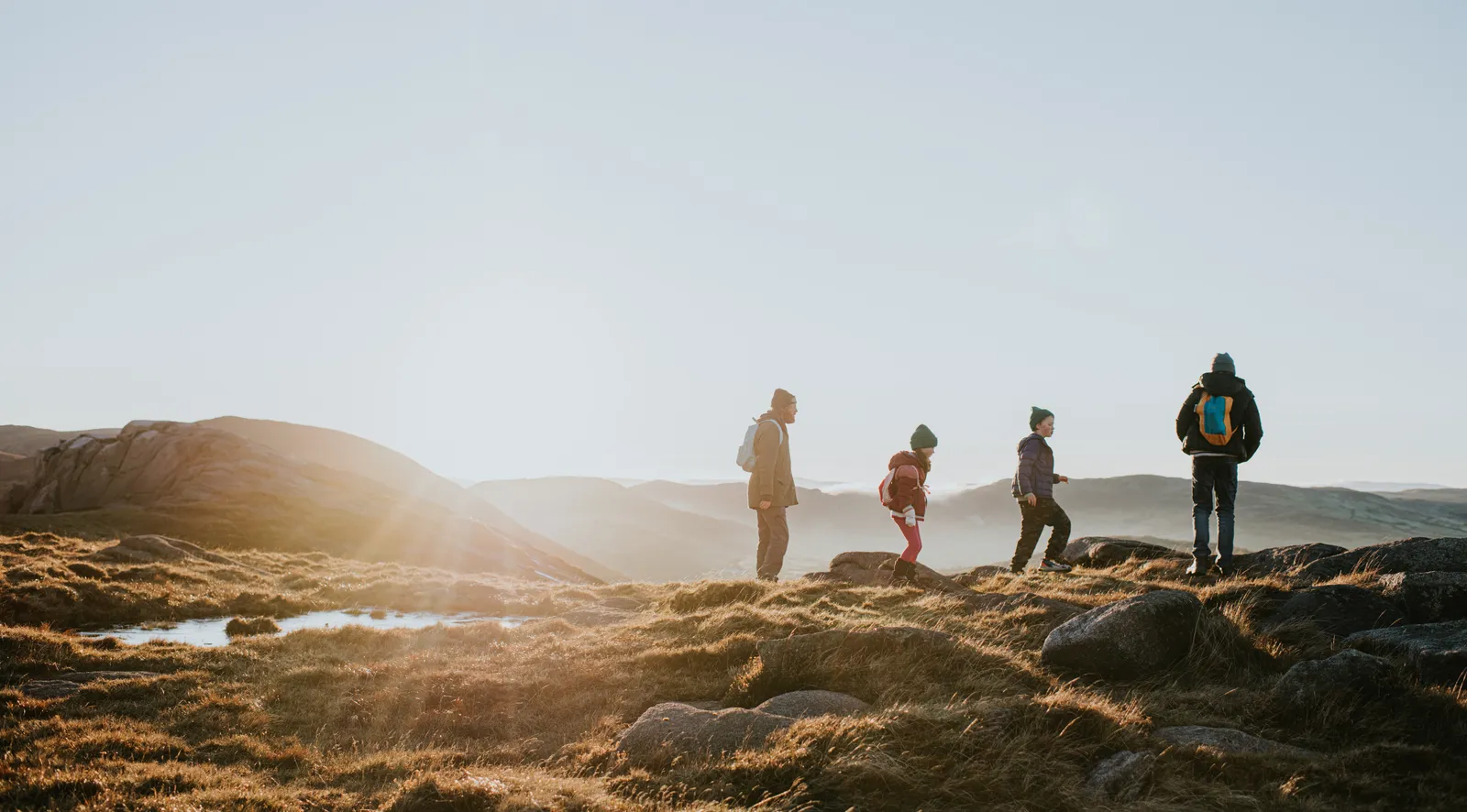 Image may contain Photography Person Walking Nature Outdoors Sky Adventure Hiking Leisure Activities and Backpack